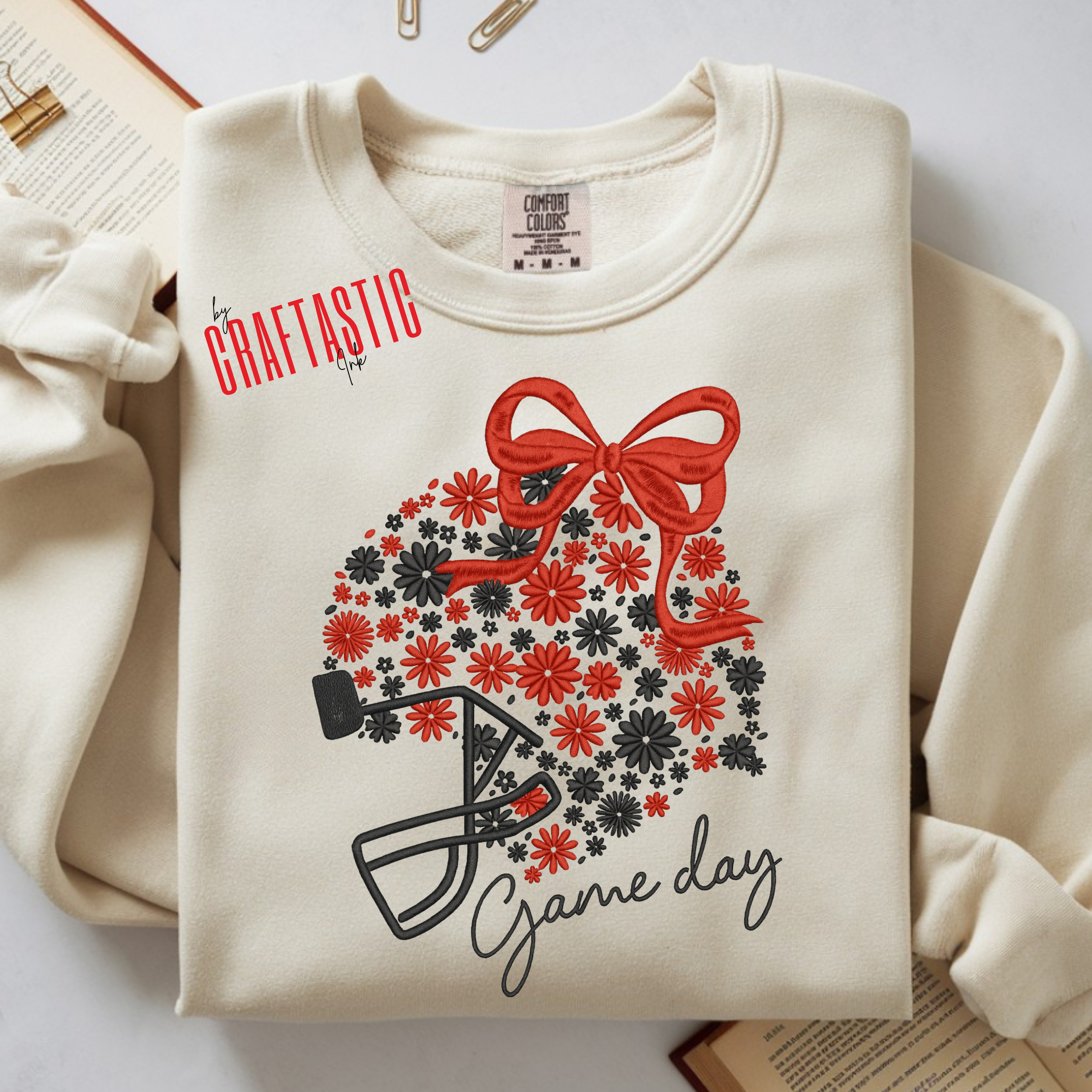 Red and black Game Day sweatshirt with floral football helmet and bow – Rovers spirit wear crewneck”