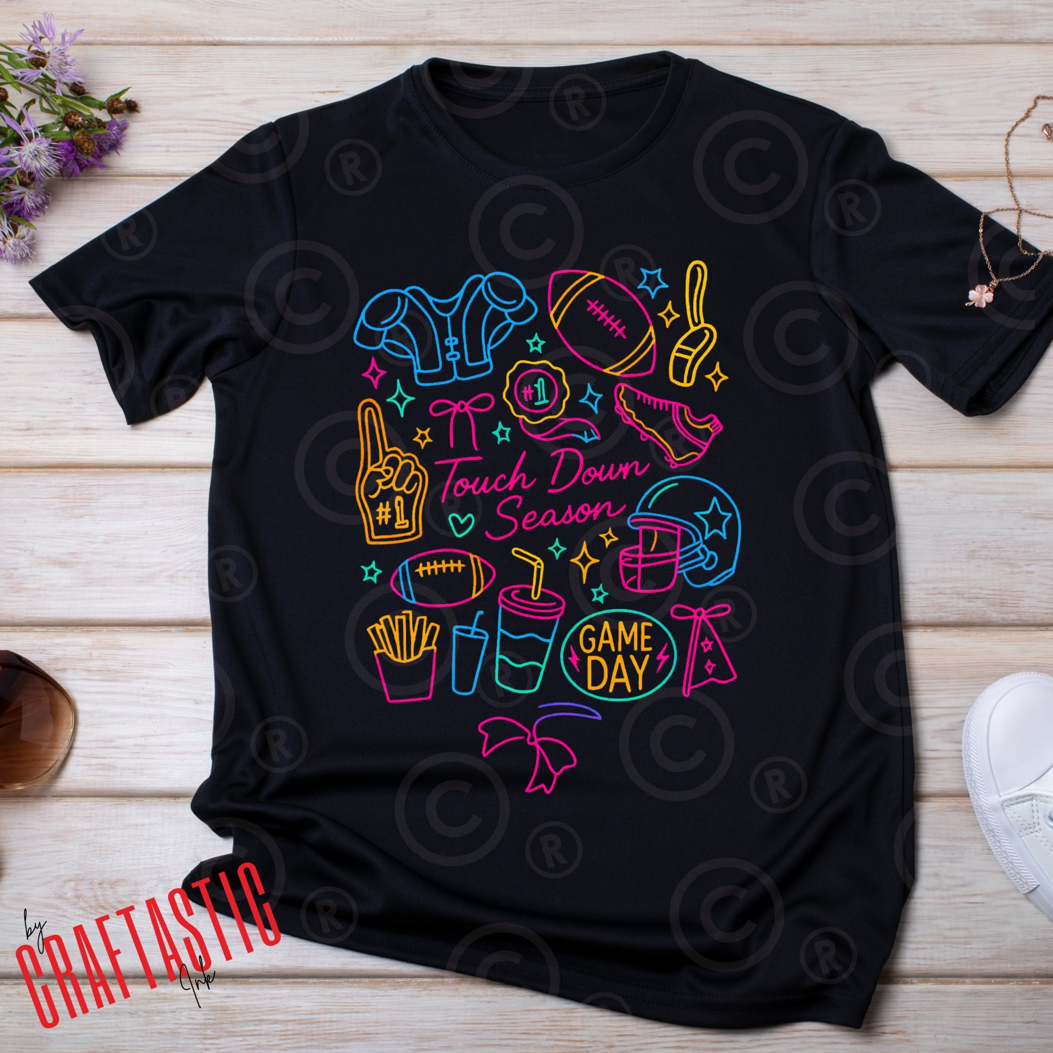 “Black Touch Down Season t-shirt with neon football icons including helmet, foam finger, french fries, soda, cheer bow, and game day badge – perfect sports fan shirt.”